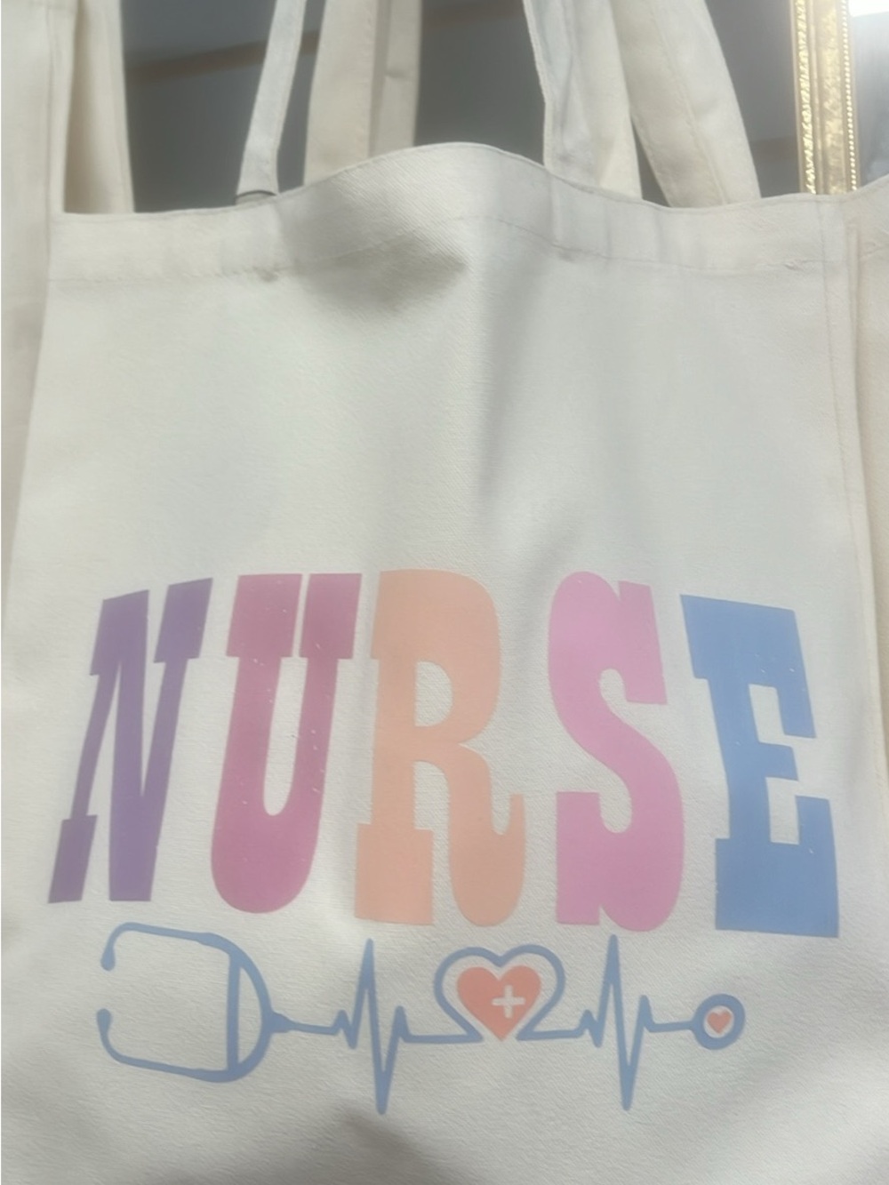 White 'NURSE' Graphic Tote Bag with Pastel Letters